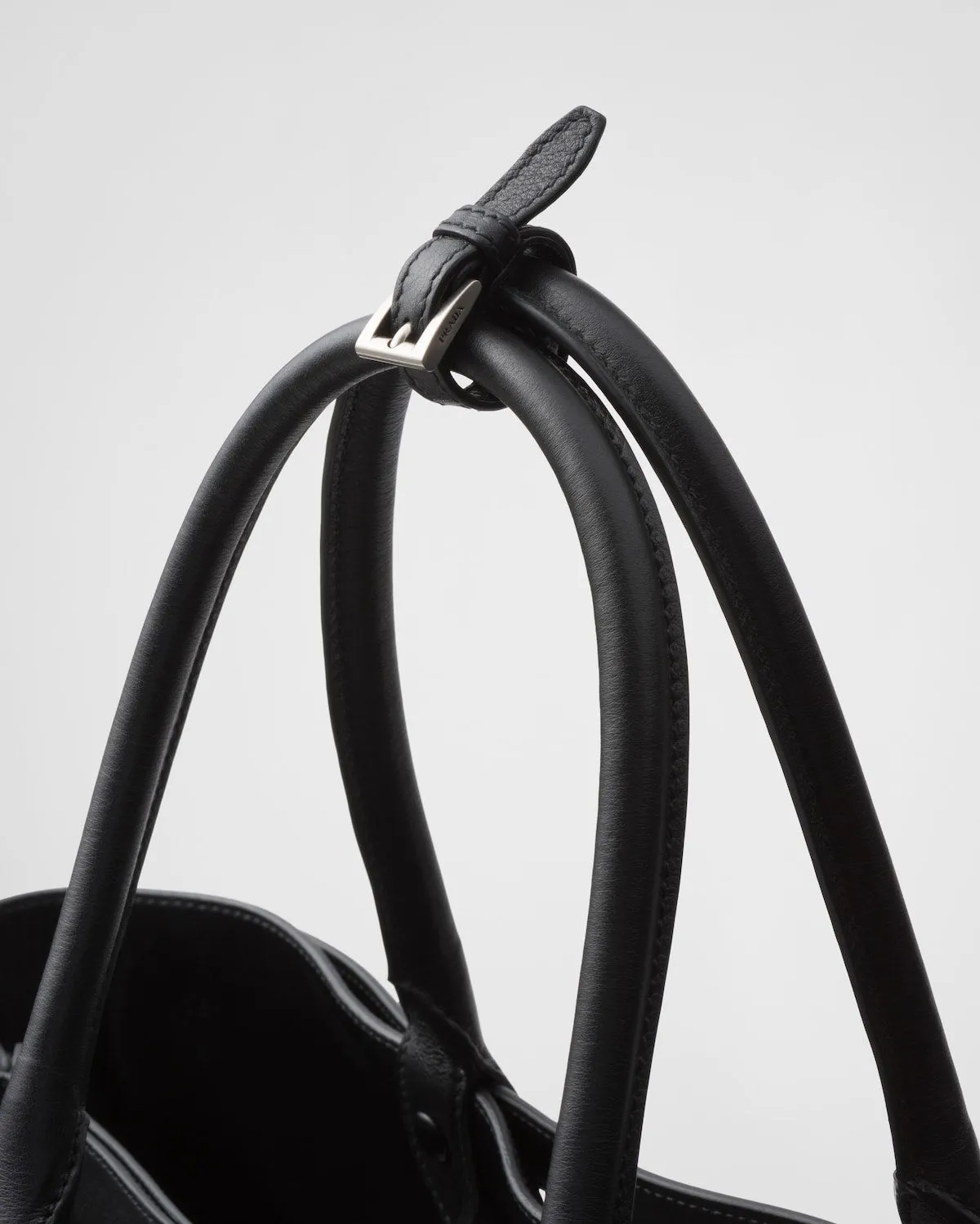 Prada Buckle leather handbag with double belt